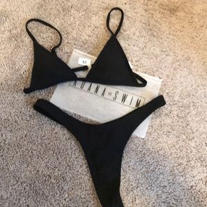 Koana swim suit never worn